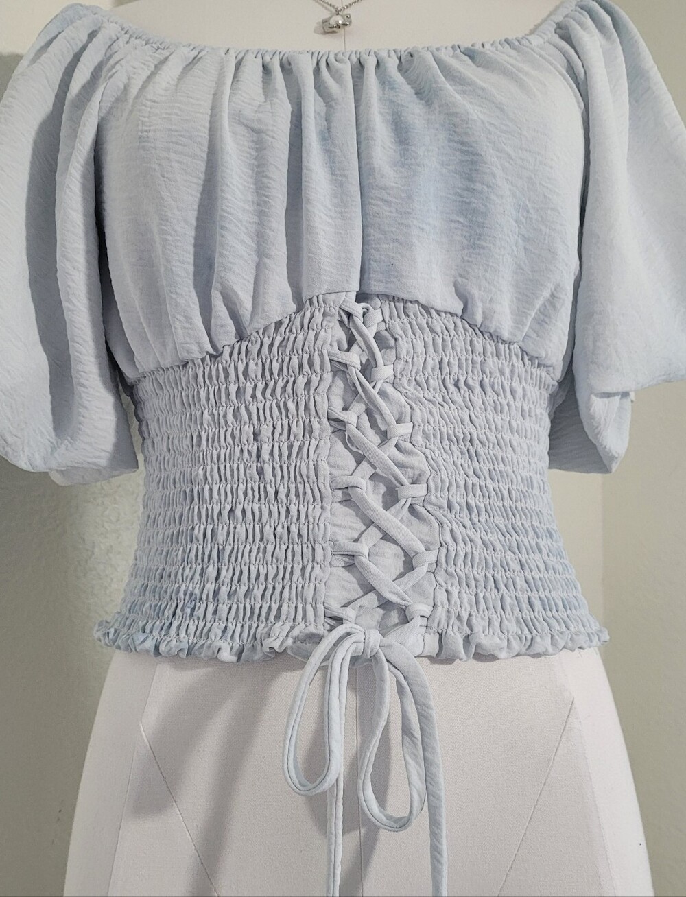 Pie In The Sky Light Blue Tie Dye Style Smocked Off-Shoulder Large Tie-Front Top